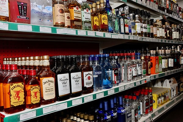 Shelves of various types of bourbons