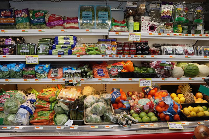 Shelves of refrigerated produce